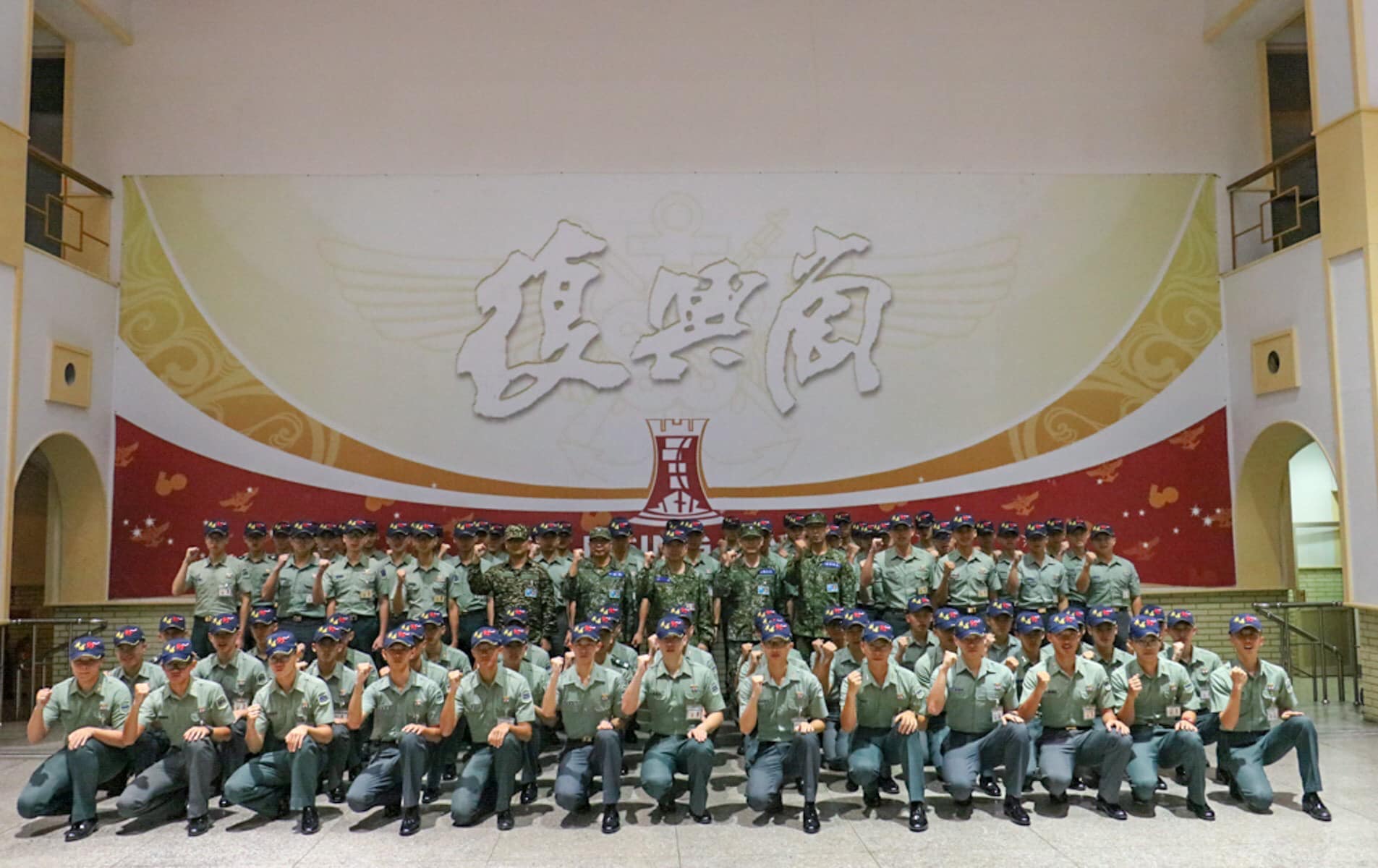 All the commanders and cadets made a gesture of “strong power.”