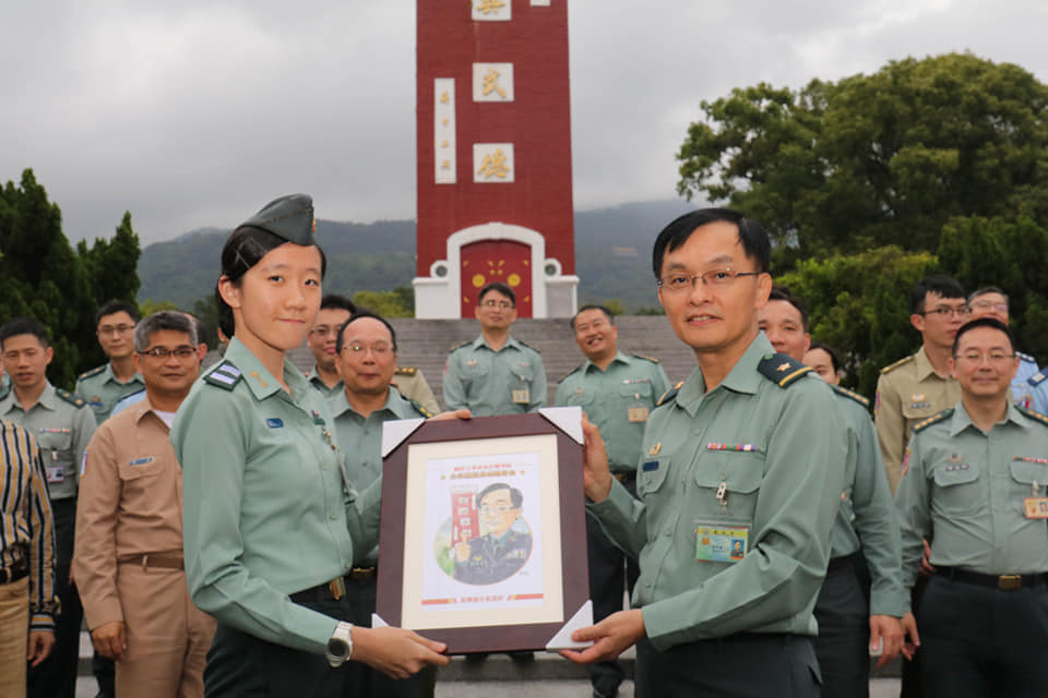 Cadet gave a drawing to the commander.