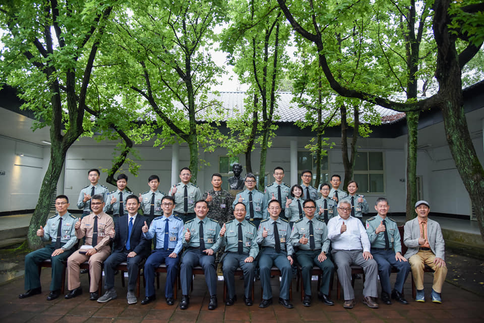 Taking the photo together after the ceremony.